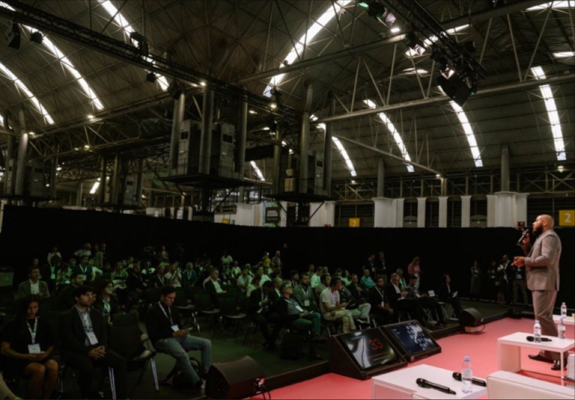 Jovonni speaking at a blockchain conference
